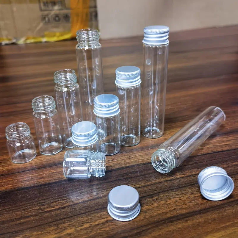 Set de 10 botellas pequeñas de vidrio de 5ml/10ml/18ml/25ml con tapa de aluminio, ideales para accesorios de viaje.